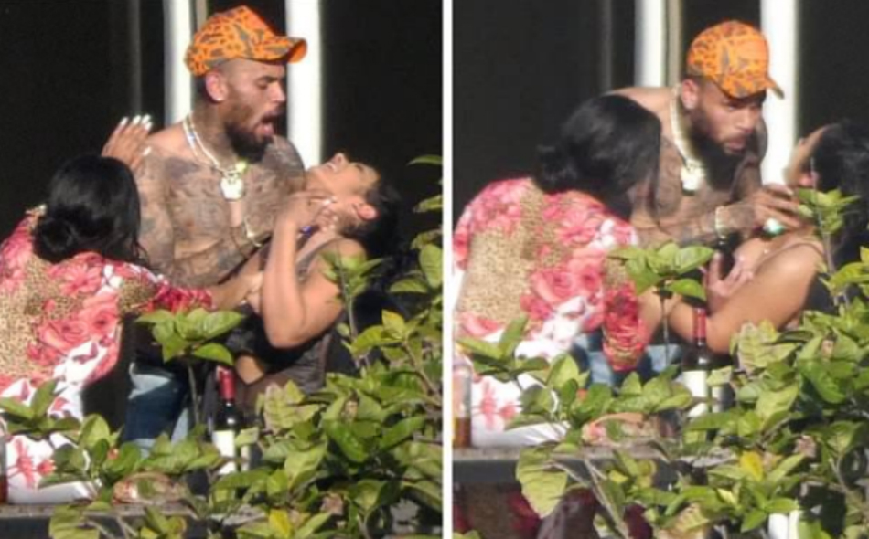 Chris Brown a fost fotografiat cand strange de gat o femeie